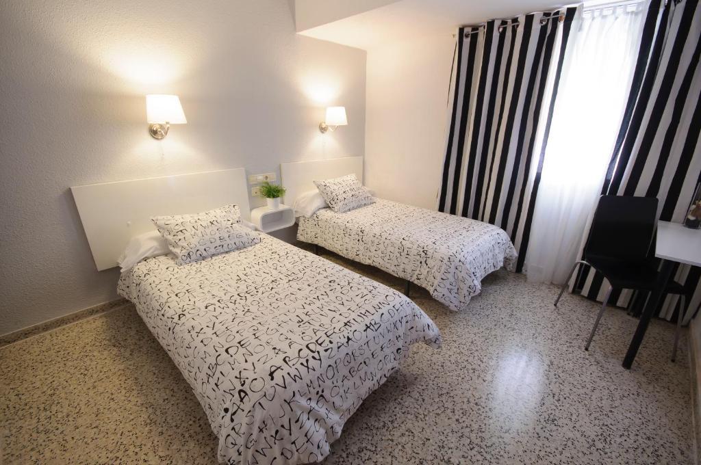 Hostal On Dormire Valence Chambre photo